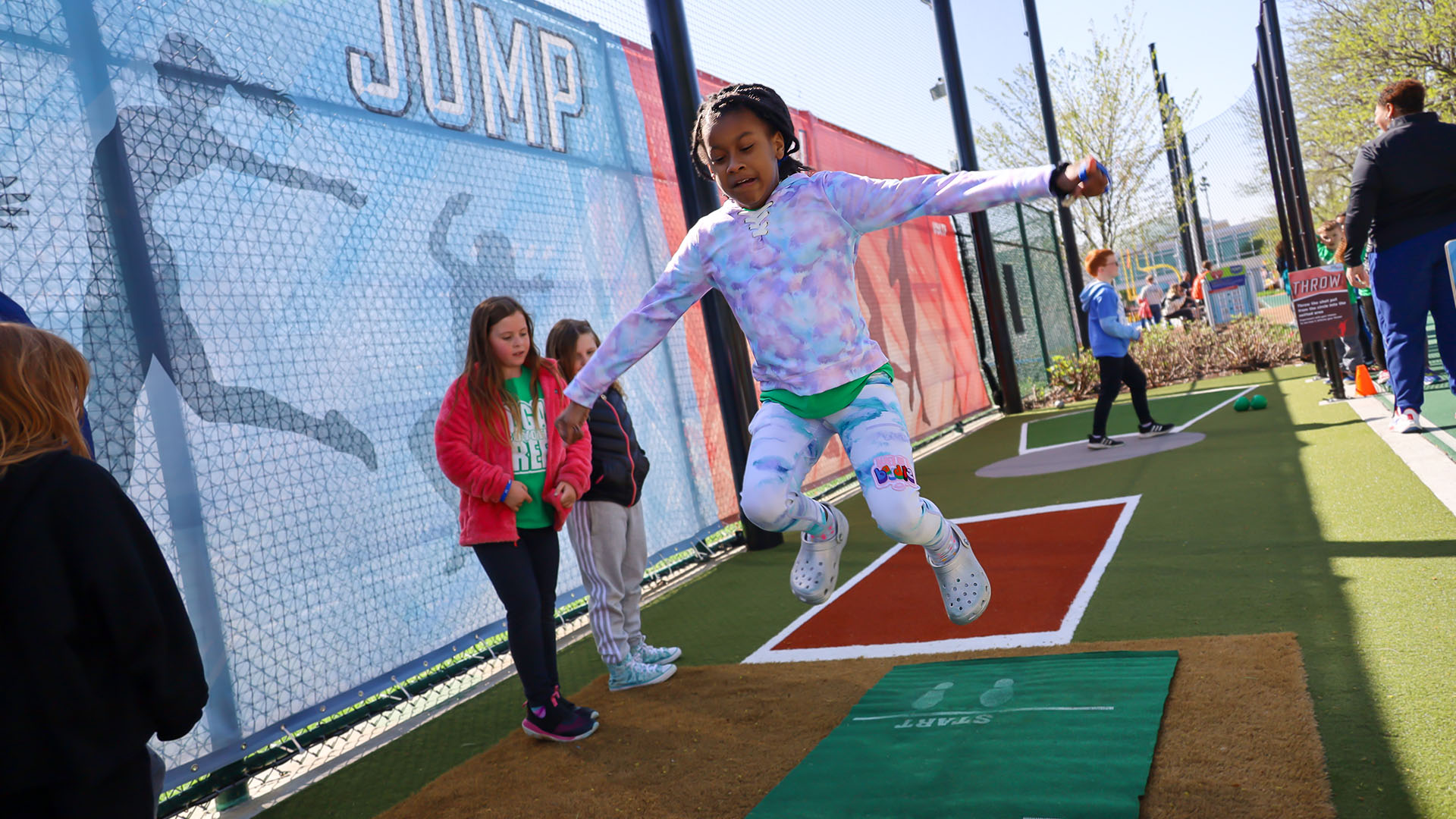 Child jumping in the air.