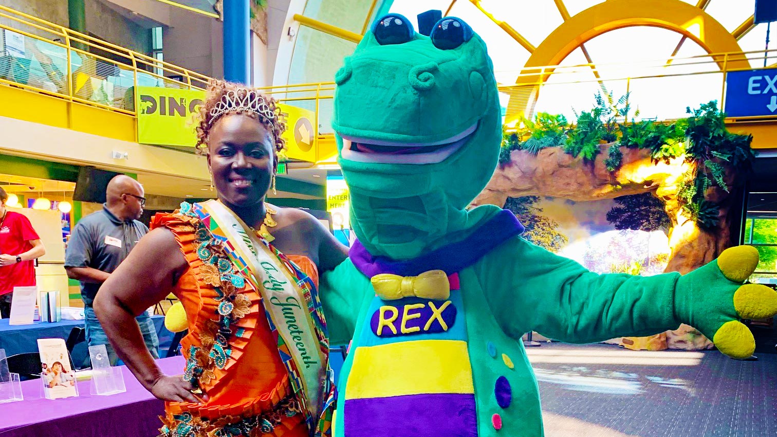 Miss Indy Juneteenth and Mascot Rex in the Sunburst Atrium.