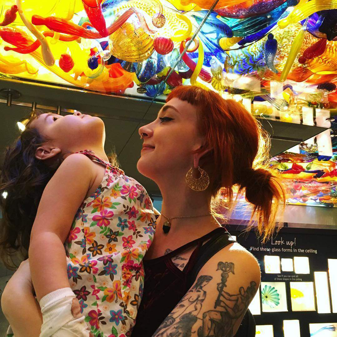 Mom and daughter in awe of the Fireworks of Glass