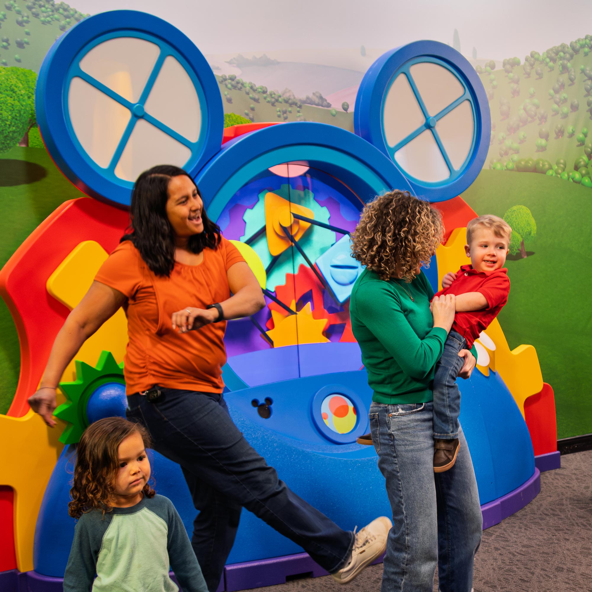 Families dancing inside the exhibit.