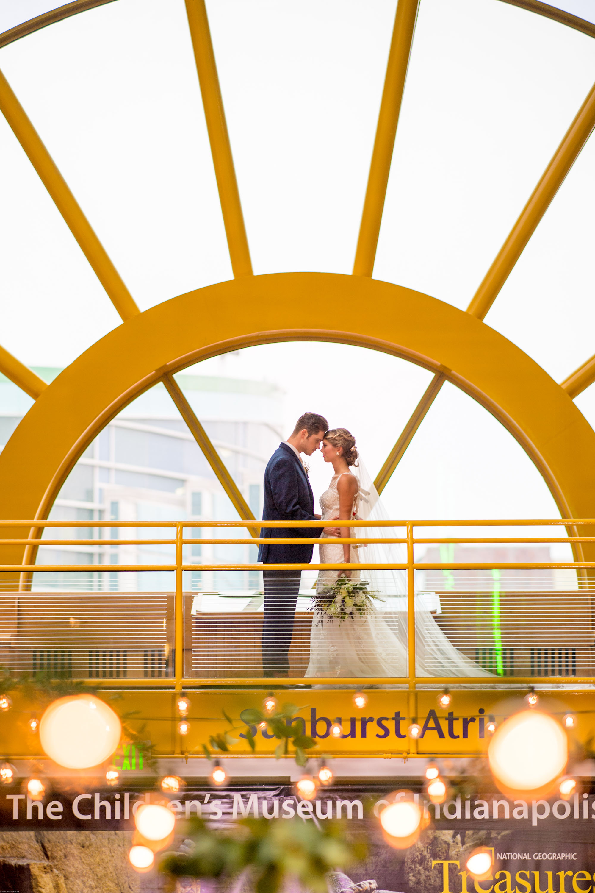 Bride and groom in Sunburst Atrium.