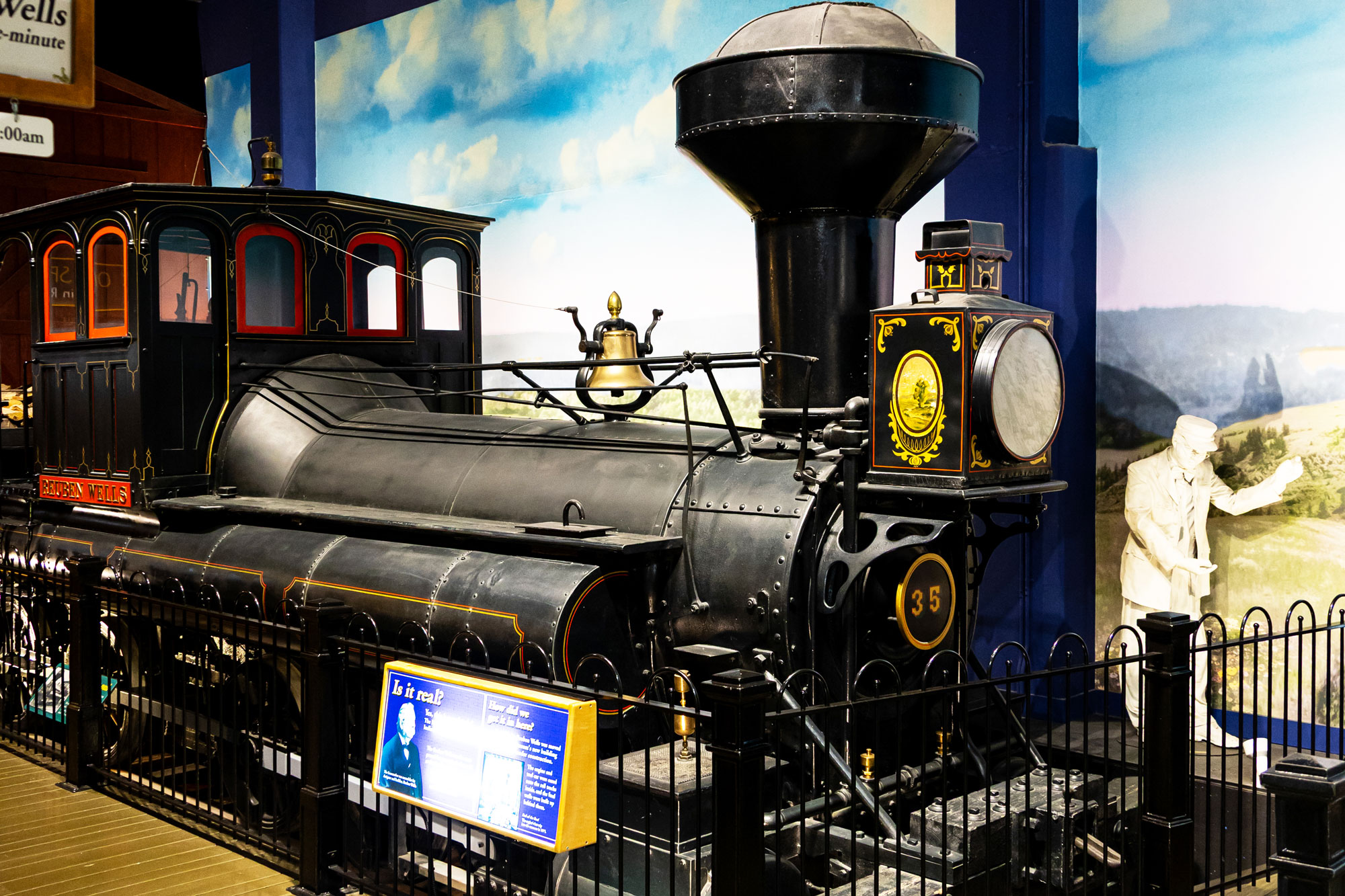 Reuben Wells train engine inside the All Aboard exhibit.
