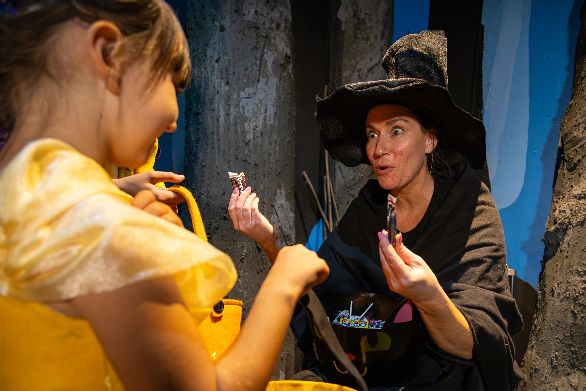 Friendly Guild Witch handing out candy.