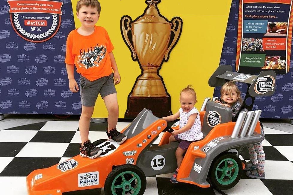 Children posing in the Winner's Circle.
