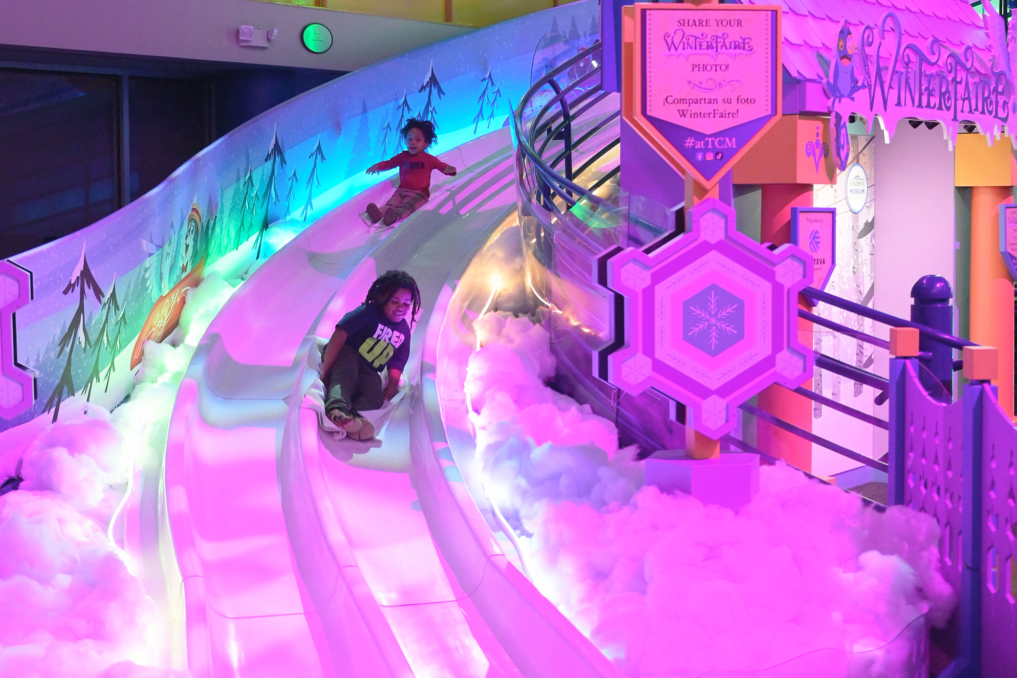 Children sliding down WinterSlide.