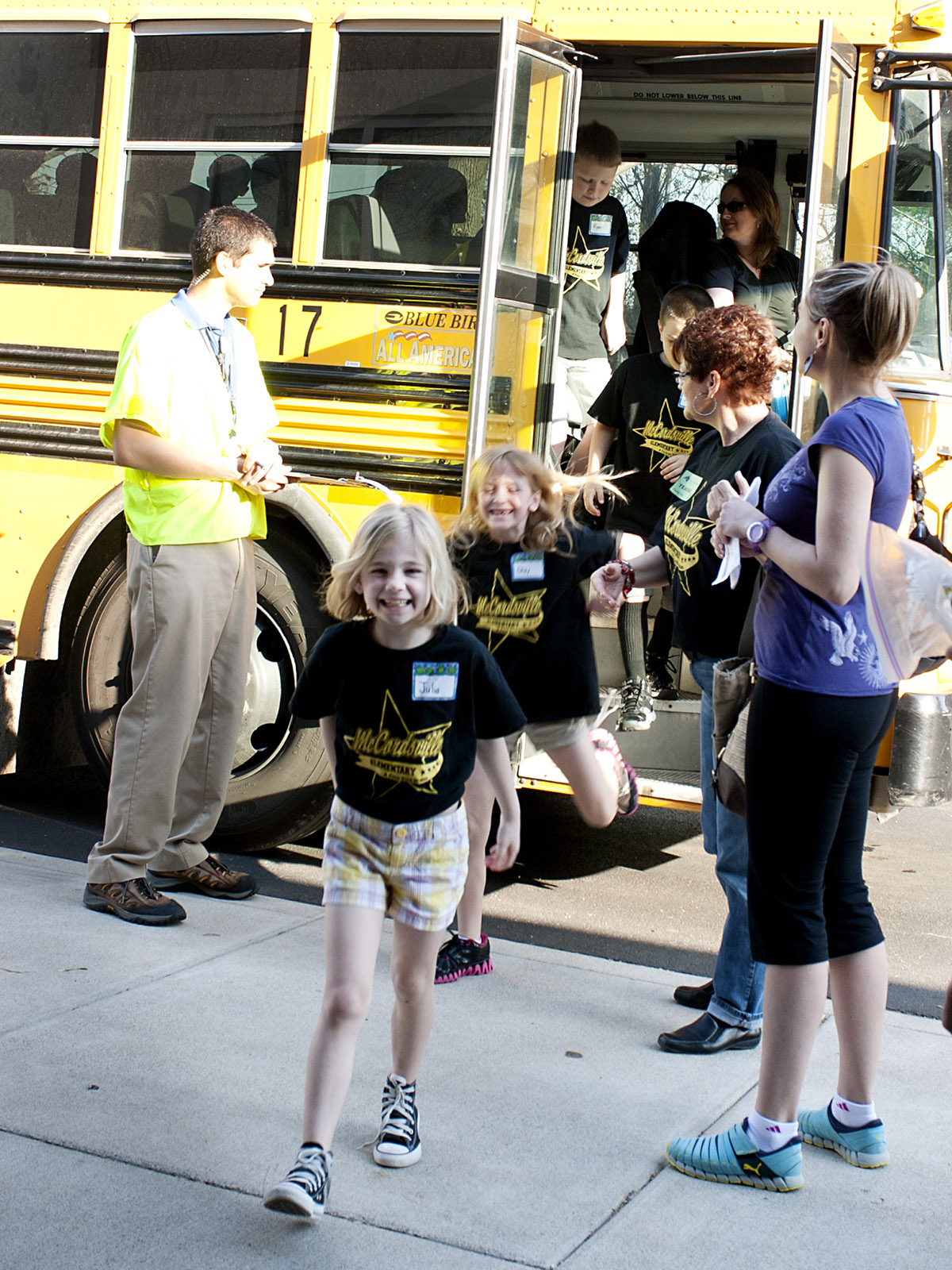 Students unloading school bus.