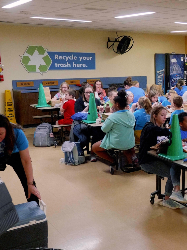 Sculptures of astronauts space walking outside museum.