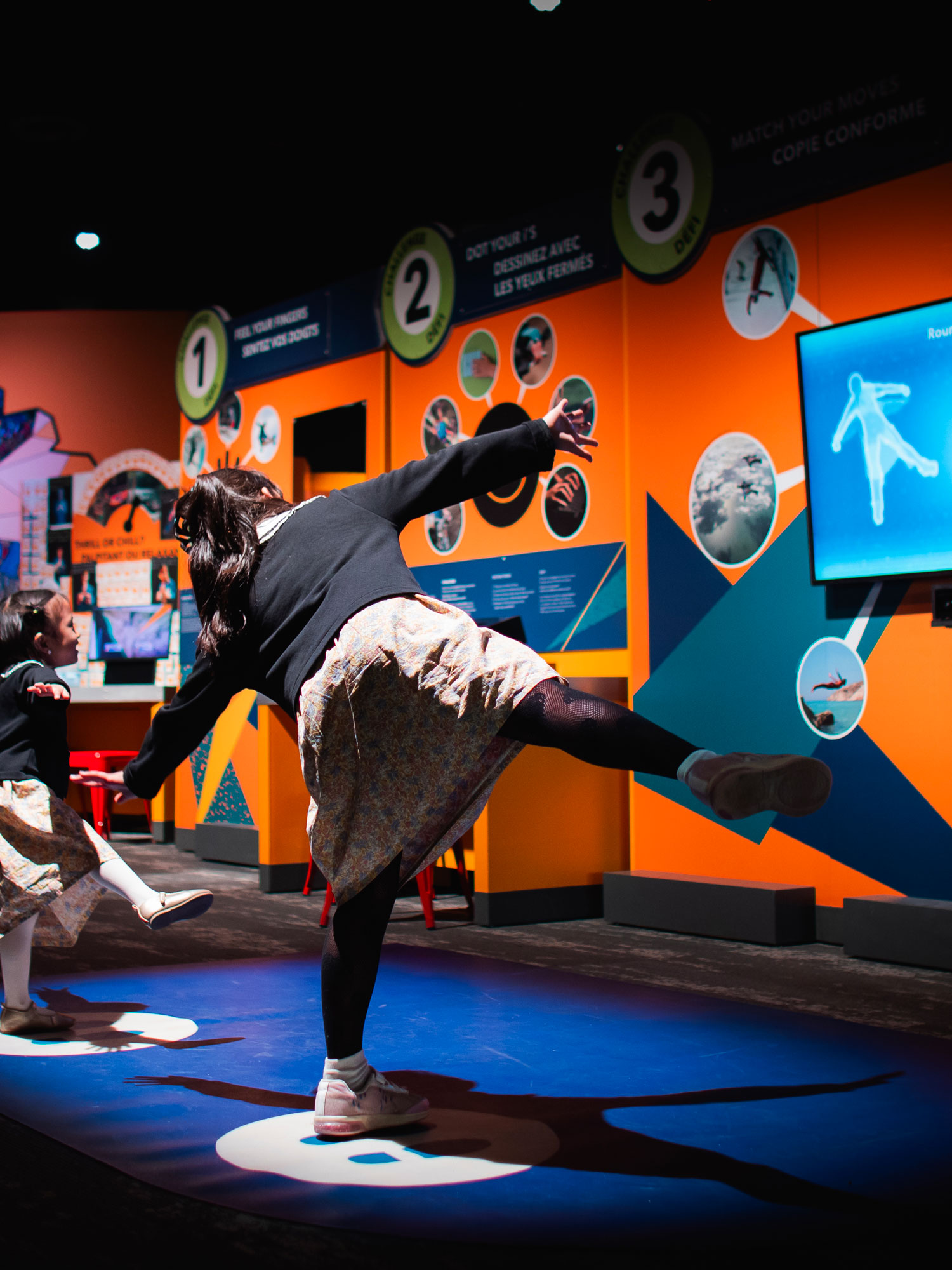 Child balancing on one foot.