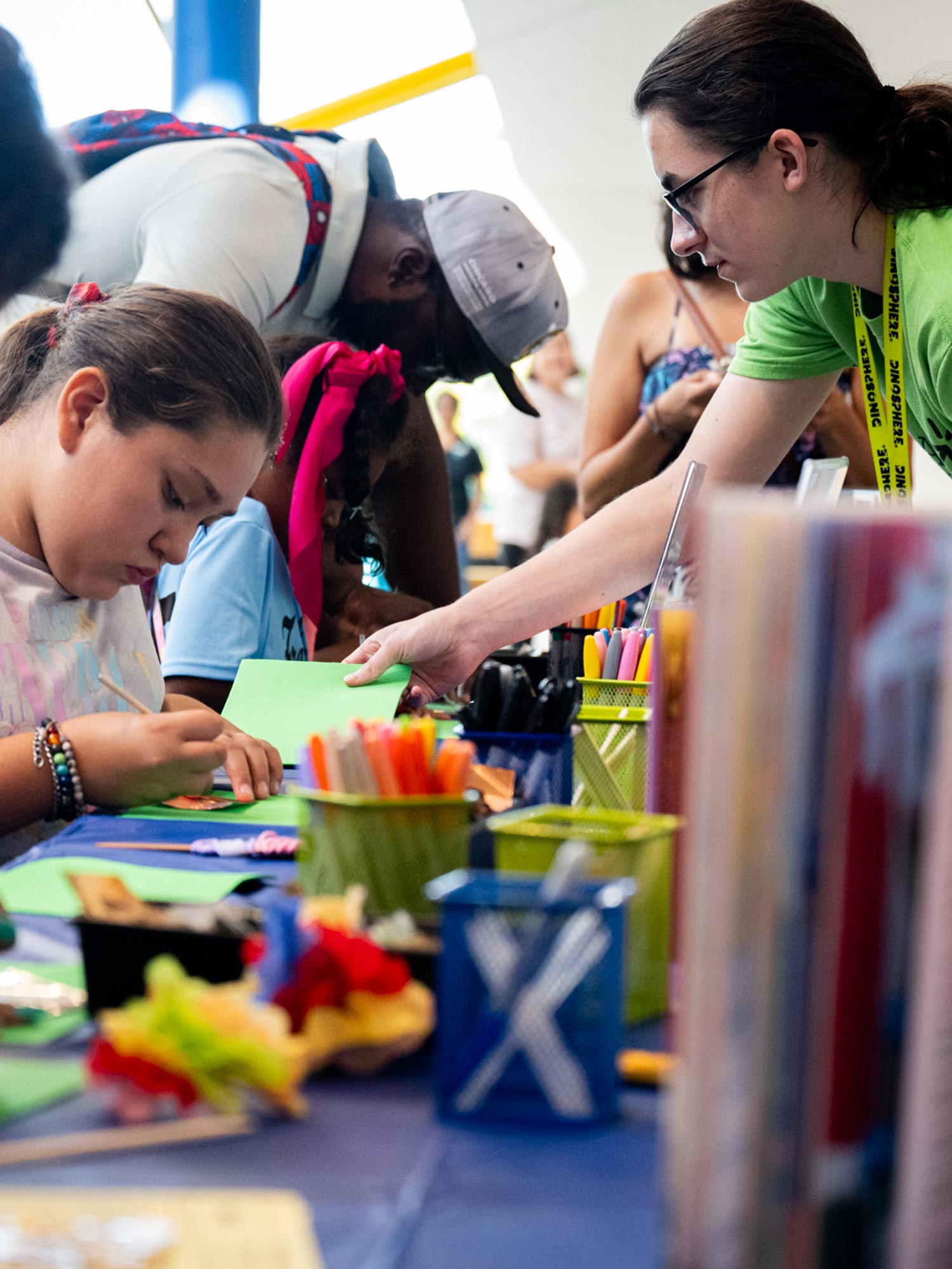 Museum Apprentice Program participants leading a tabletop activity at Countdown to Noon.