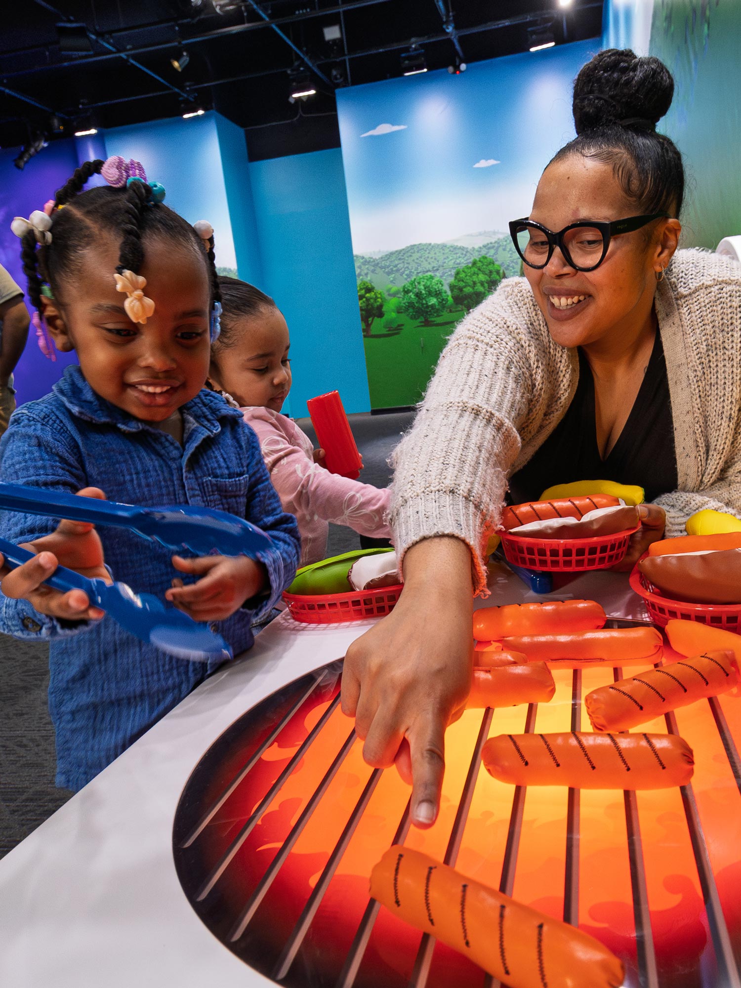 Child pretending to grill food.