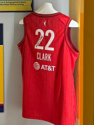 Caitlin Clark signed red Indiana Fever jersey.