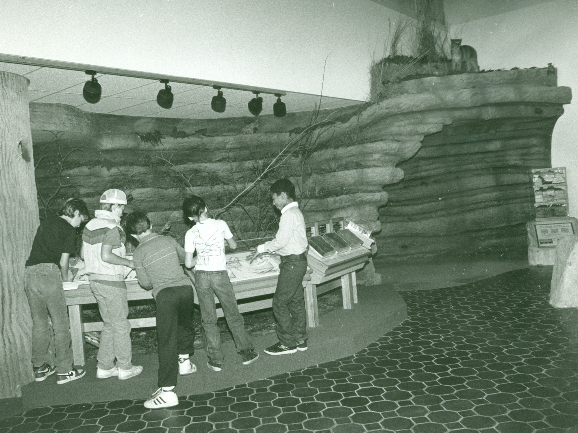 Archive photo of children playing in cave.