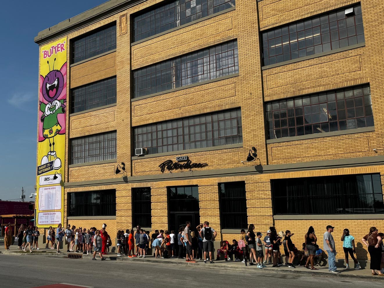 People outside BUTTER Fine Art Fair at the Stutz Building.