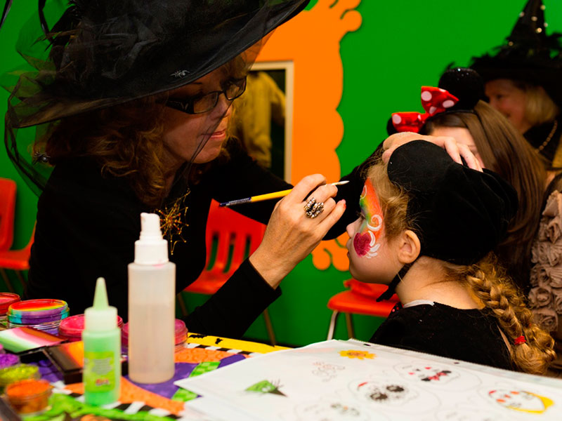The Children's Museum Guild witch applying make-up at The Children's Museum of Indianapolis