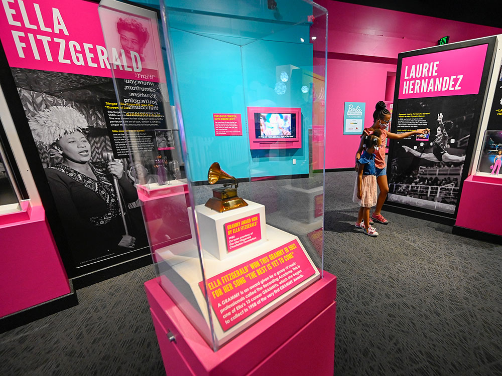 Role Models Ella Fitzgerald and Laurie Hernandez in Barbie You Can Be Anything: The Experience at The Children's Museum of Indianapolis