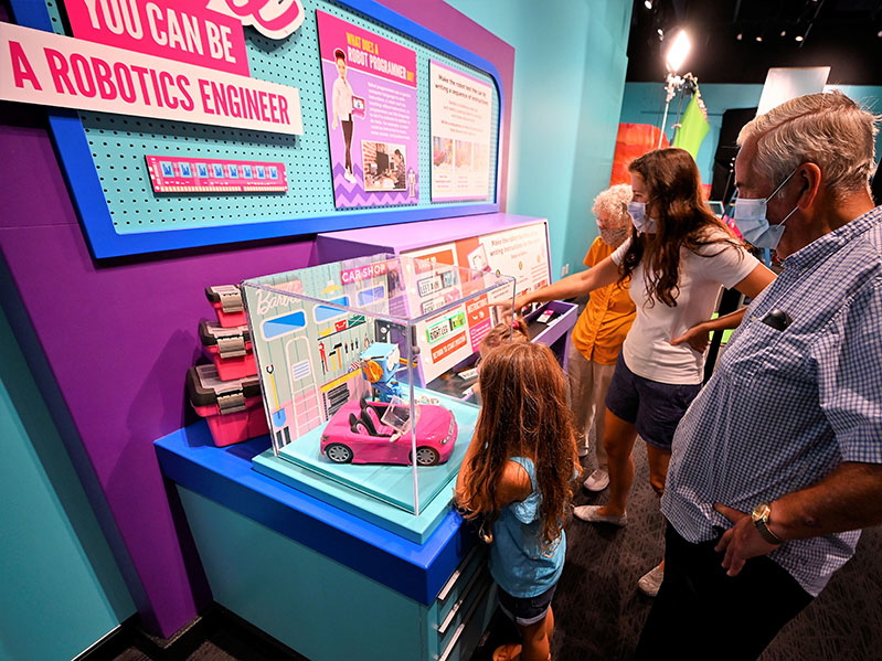 You can be a problem solving robotics engineer in Barbie You Can Be Anything: The Experience at The Children's Museum of Indianapolis