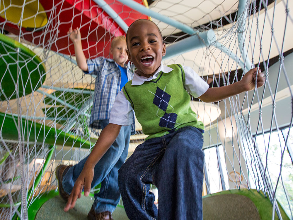 Children climbing in Playscape at The Children's Museum of Indianapolis