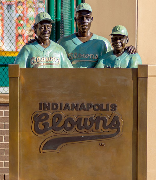 Hank Aaron and the Indianapolis Clowns statue in the Riley Children's Health Sports Legends Experience at The Children's Museum of Indianapolis