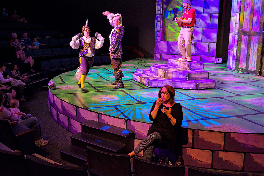 ASL interpreter in Lilly Theater at The Children's Museum of Indianapolis