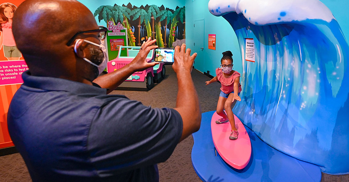 Surfing inside Barbie You Can Be Anything: The Experience at The Children's Museum of Indianapolis