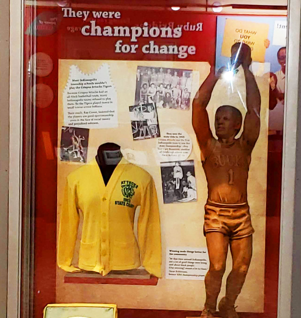 Oscar Robertson and the Crispus Attucks High School Tigers basketball team display in the Ruby Bridges gallery inside The Power of Children: Making a Difference exhibit at The Children's Museum of Indianapolis