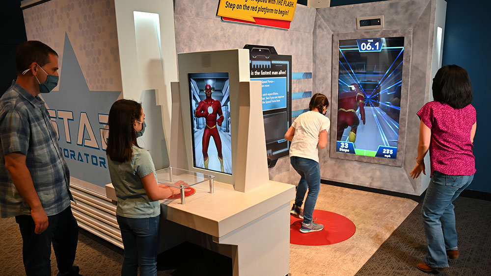 Enter S.T.A.R. Labs and race The Flash in DC SUPER HEROES: Discover Your Superpowers at The Children's Museum of Indianapolis