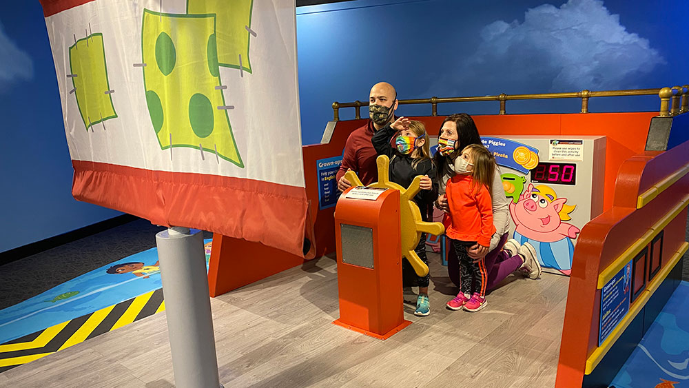 Sail the high seas in the Pirate Piggies' ship inside Nickelodeon's Dora and Diego—Let's Explore! exhibit at The Children's Museum of Indianapolis