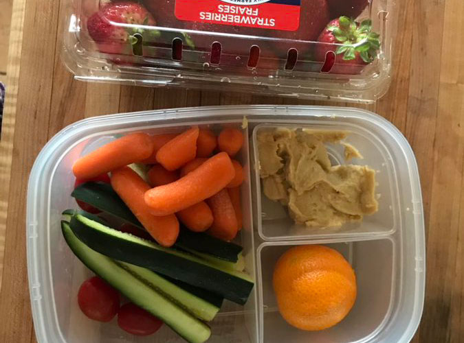 snacks - veggies, hummus, and strawberries