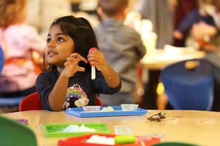 Child at the Indiana State Museum, an Access Pass participant