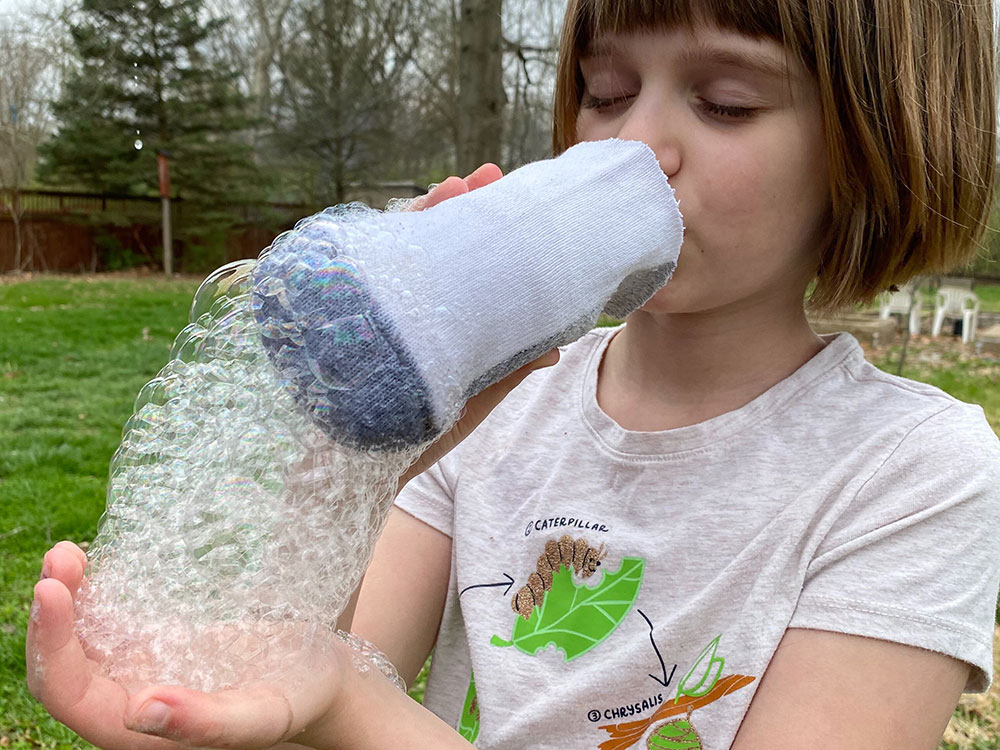 MJ making a bubble snake for Museum at Home with The Children's Museum of Indianapolis