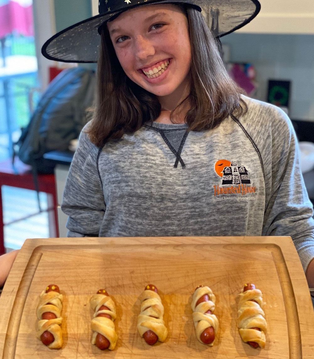 Mummy hot dogs and candy corn fruit cup from The Children's Museum Guild witches