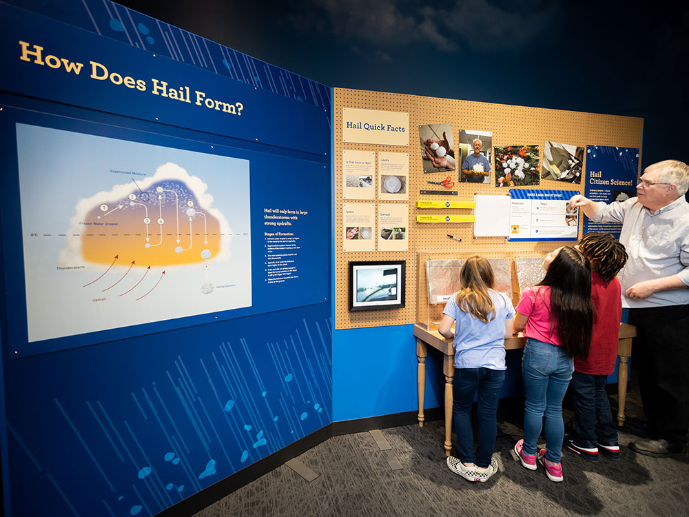 Hail interactive display in the Thunderstorms Zone inside the Wild Weather exhibit at The Children's Museum of Indianapolis