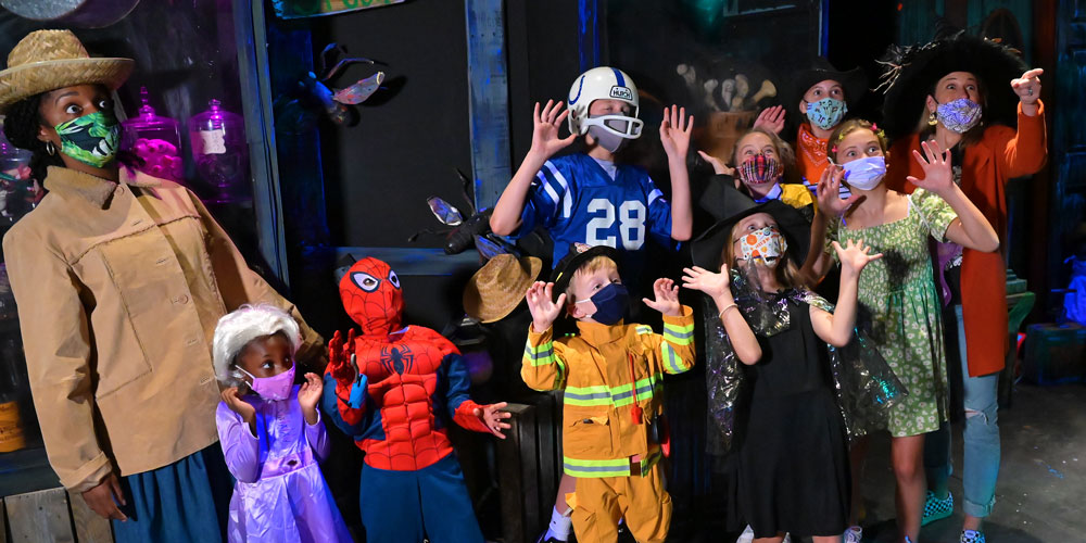 People wearing costumes at The Children's Museum Guild's Annual Haunted House