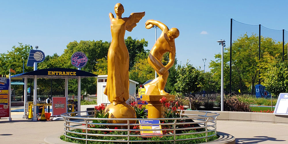 Fiberglass statues of Nike and Disobolus in the Riley Children's Health Sports Legends Experience at The Children's Museum of Indianapolis.