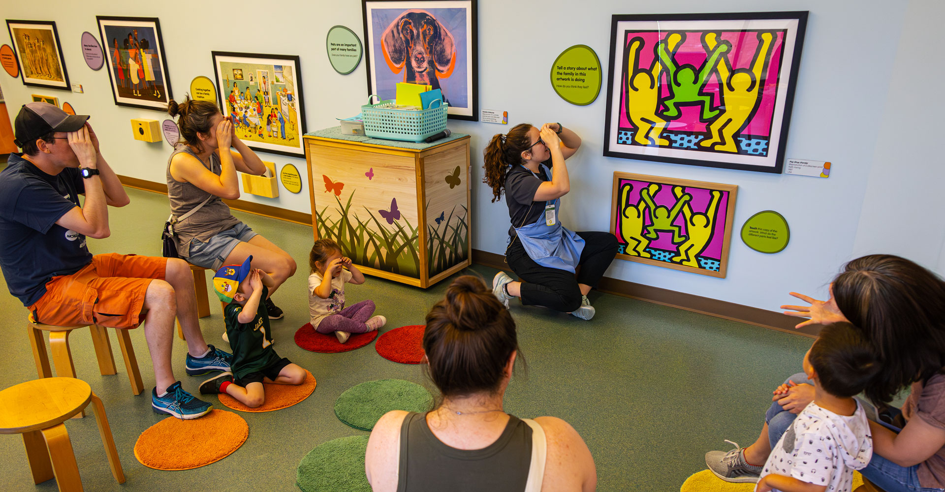 Children looking at a piece of art.