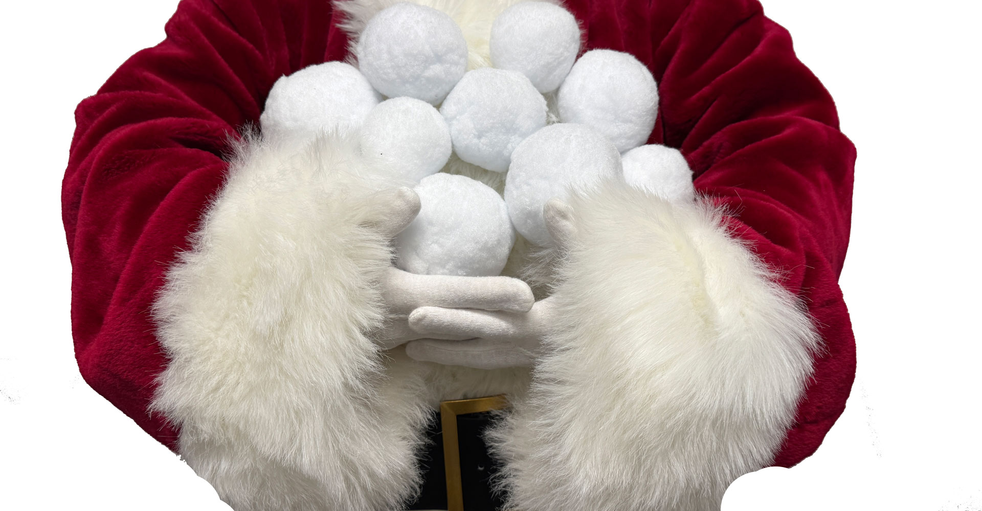 Close up of Santa holding a pile of snowballs in his arms.