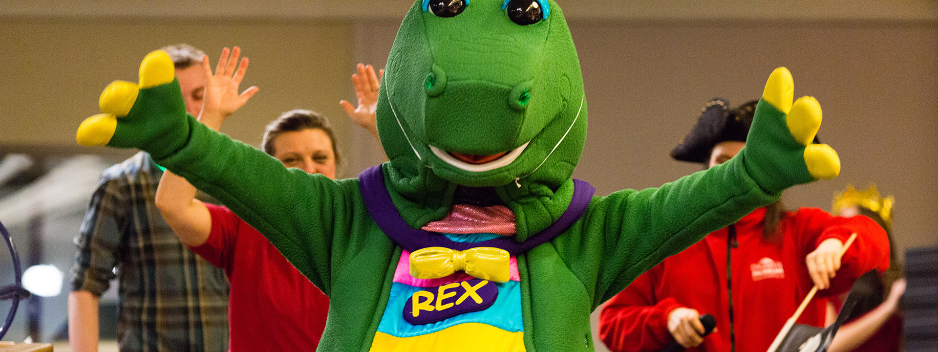 Rex leading the End of Day Parade at The Children's Museum of Indianapolis