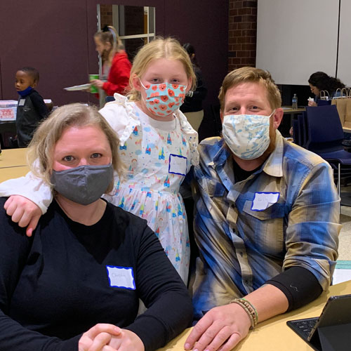 Family at a neighborhood workshop 