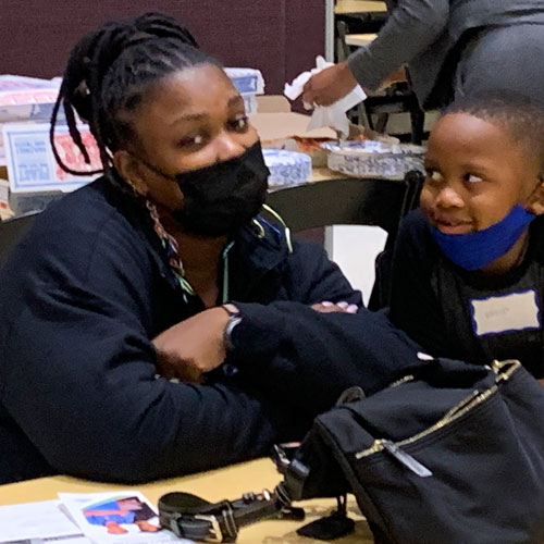 Family at a neighborhood workshop