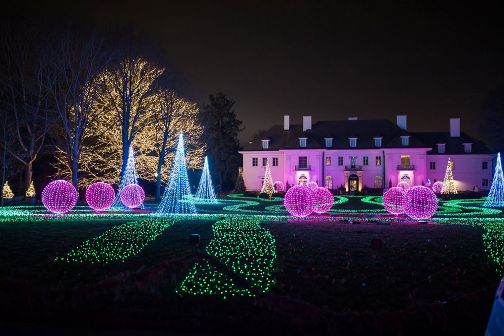 Lighted landscape with nighttime background.