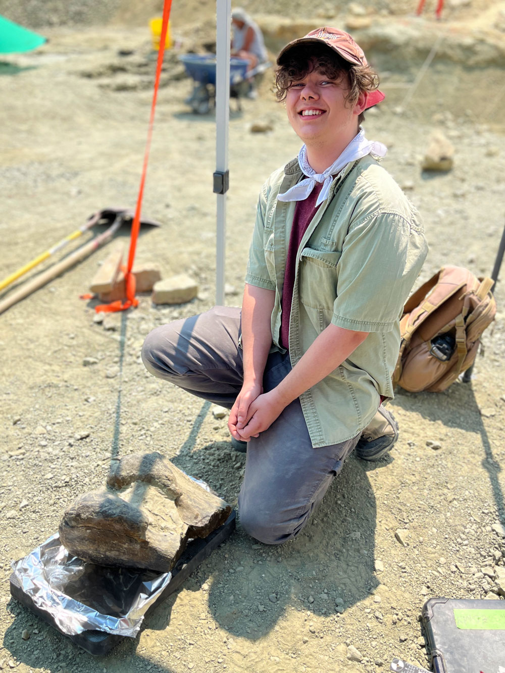 2024 Paleontology Intern Jayce Jones at The Jurassic Mile dig site in Wyoming.