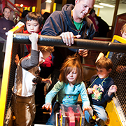 Image of family in a bulldozer interactive.